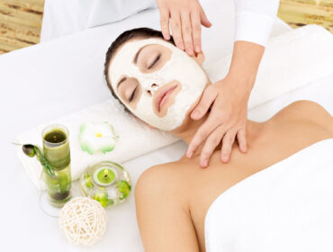 young-woman-spa-salon-with-cosmetic-mask-face-high-angle-photo